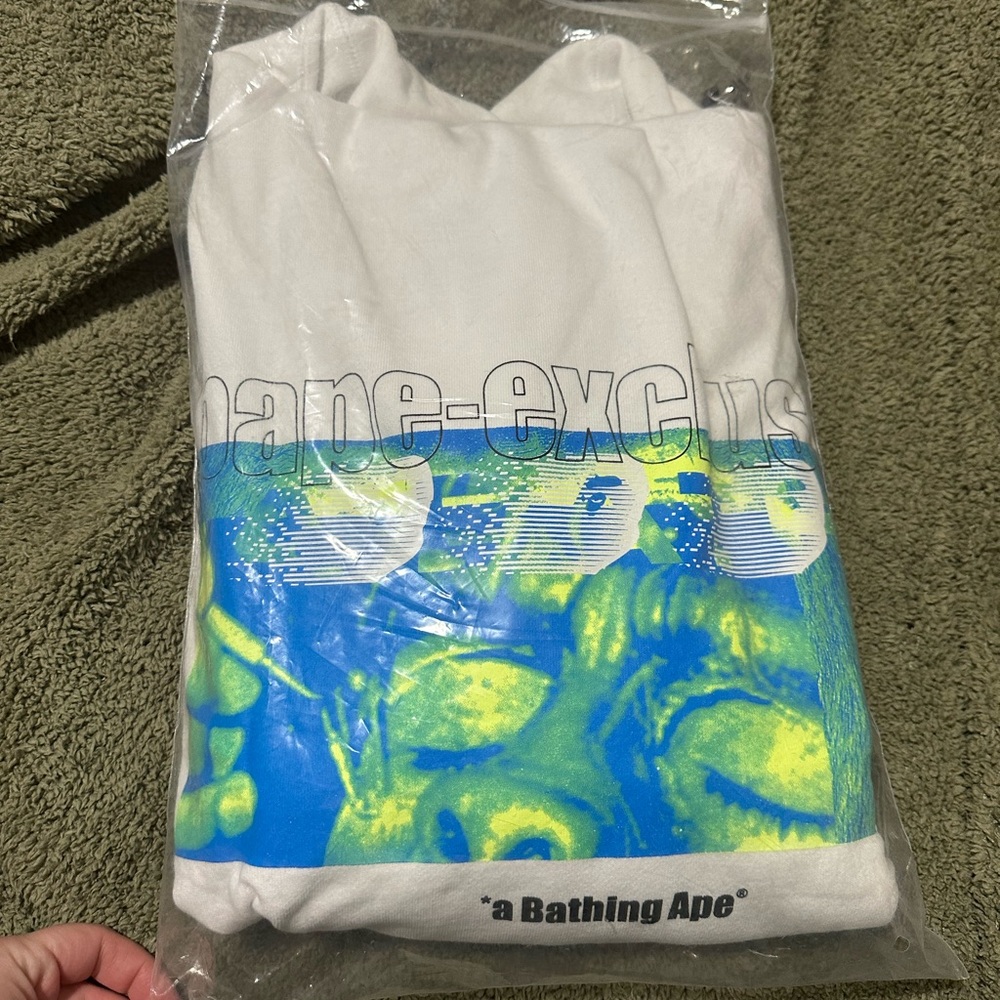 Brand new with tags. Bape exclusive hoodie. White size XL